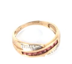 A 9ct gold, diamond and pale red stone set ring, approx UK size N, 1.8g.