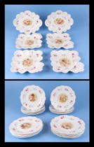 A 19th century dessert set, decorated flowers and a birds nest.