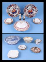 A Victorian blue and white willow pattern cake stand, two Masons Iironstone plates, an early Ainsley