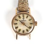 A 9ct gold cased ladies Tissot wrist watch.