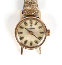 A 9ct gold cased ladies Tissot wrist watch.