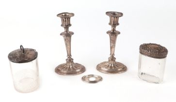 A pair of Edwardian weighted silver candle sticks, Birmingham 1903, 17cm high, 489g, a silver lidded