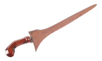 A 18th century South East Asian kris, with watered steel blade and carved hardwood handle, 48cm