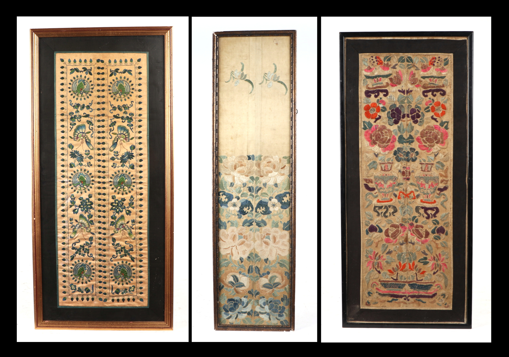 A Chinese embroidered silk sleeve panel decorated with flowers and foliage, 18 by 73cm; together