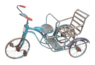 A Burmese tubular steel child's tricycle.