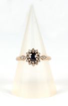 A 9ct gold sapphire and diamond cluster ring, approx 2g, UK size K.