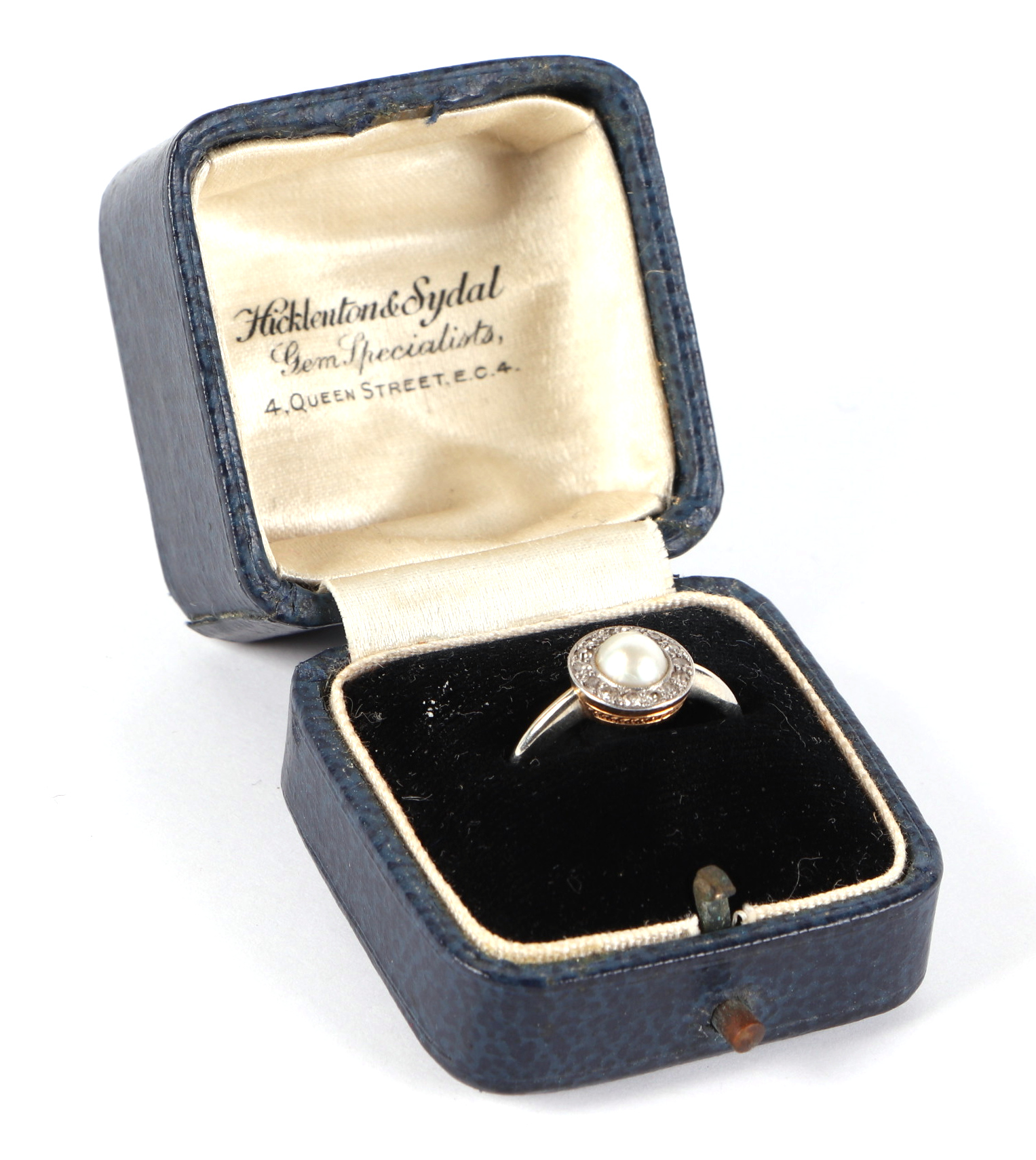 An 18ct white gold and platinum diamond and pearl ring, the head set with central pearl surround