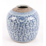 A late 18th / early 19th century Qing blue and white rice jar, with repeating floral decoration,