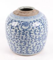 A late 18th / early 19th century Qing blue and white rice jar, with repeating floral decoration,