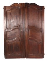 A pair of French carved Cherrywood doors, each 64cm wide, 160cm high (2)