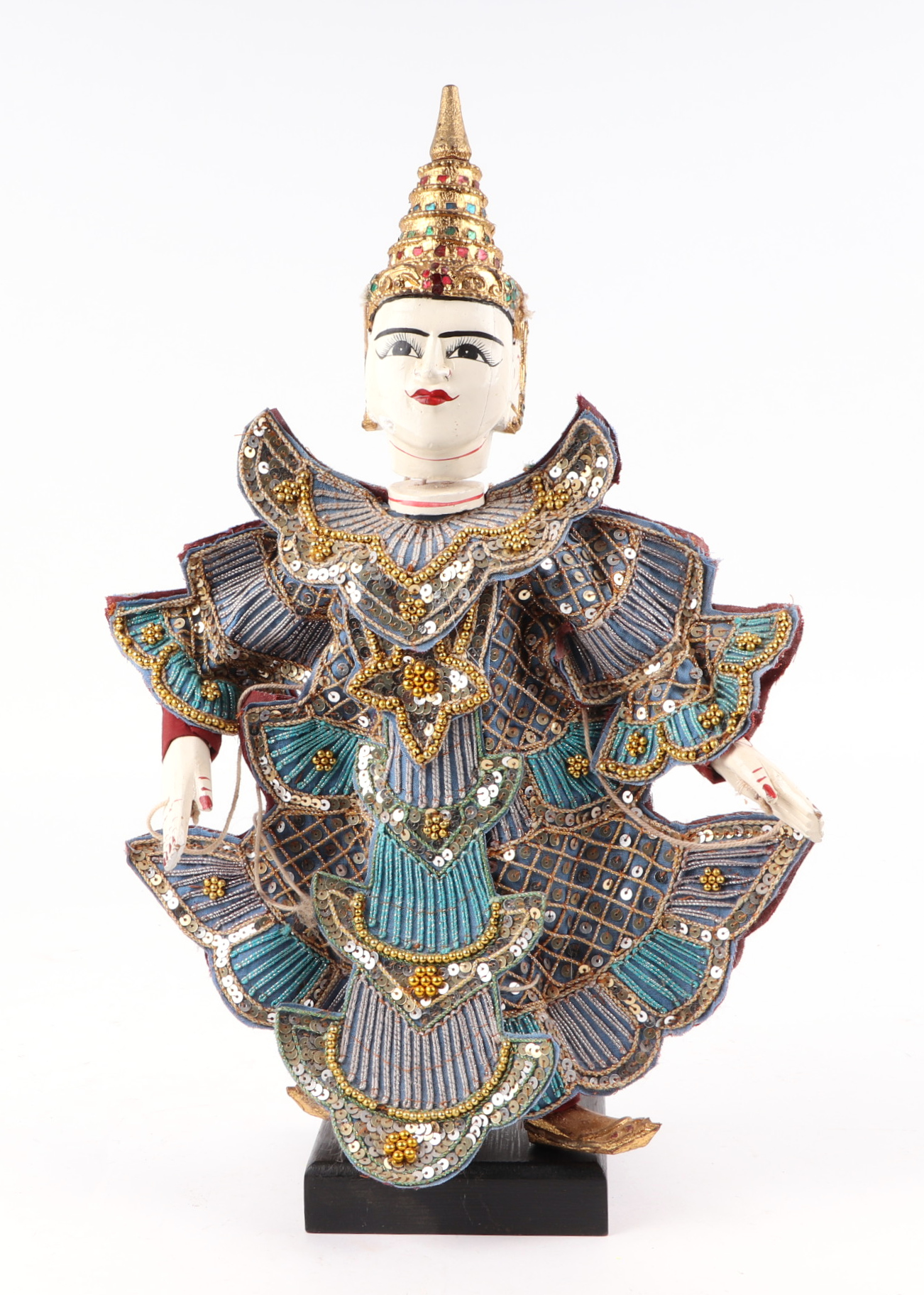 A Burmese painted wooden puppet on stand, 40cm high.