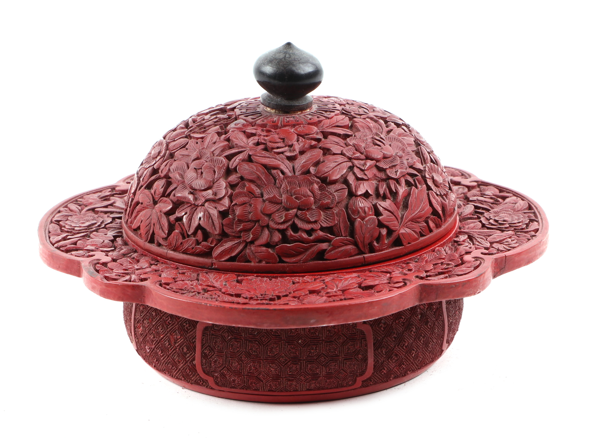 An 18th century Chinese carved cinnabar lacquer lobed bowl and cover, Zhadou. The circular shaped