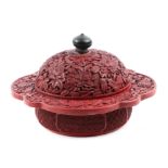 An 18th century Chinese carved cinnabar lacquer lobed bowl and cover, Zhadou. The circular shaped