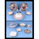 A Victorian blue and white willow pattern cake stand, two Masons Iironstone plates, an early Ainsley