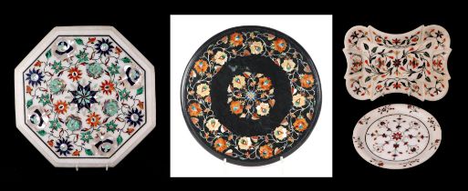 An Indian black marble and multi stone inlay, Pietra Dura style, marquetry circular table top panel,