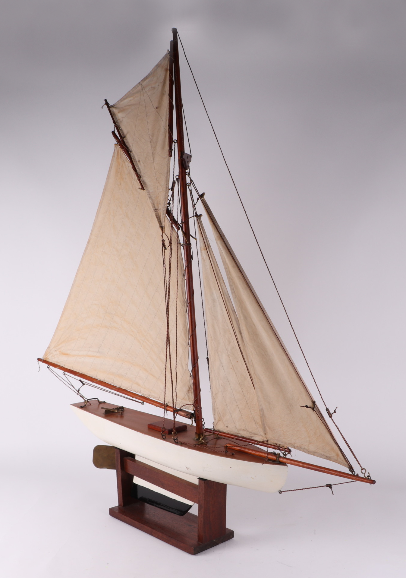 A pond yacht, having a painted hull, 72cm long, mounted on a stand. Condition Report Looks to be - Image 2 of 14