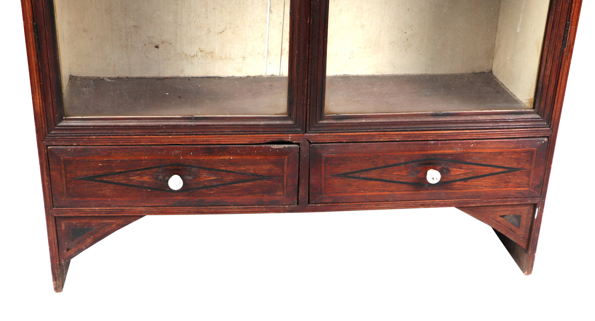 A teak display cabinet, having twin glazed doors enclosing shelves, above a drawer, 86cm wide. - Bild 2 aus 3