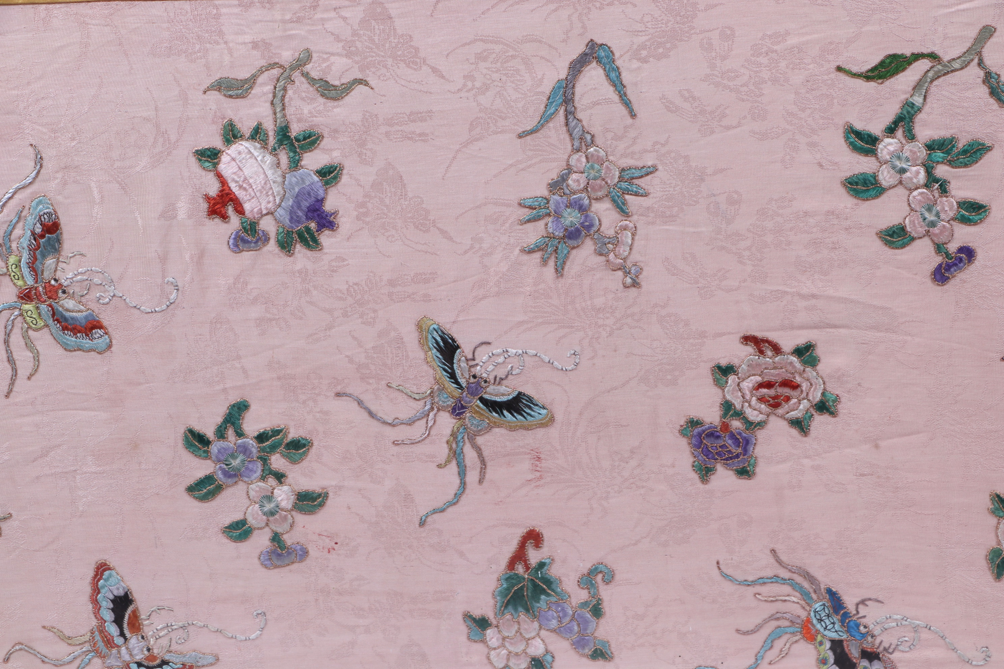 A large Chinese silk embroidered panel, depicting butterflies and flower, 55cm by 101 cm. - Image 2 of 4