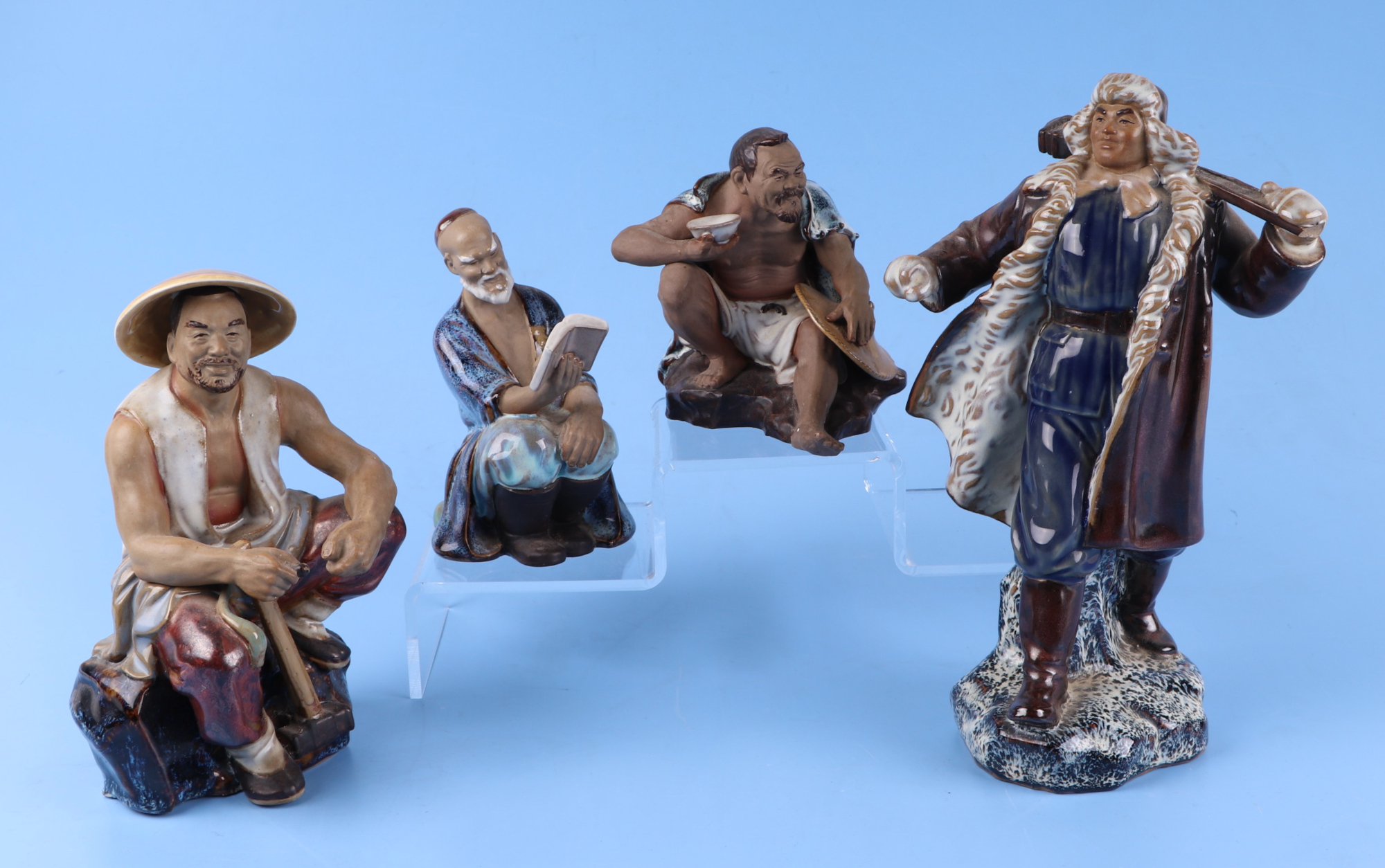 A group of glazed Chinese pottery figures, largest 26cm high (8). - Image 2 of 2