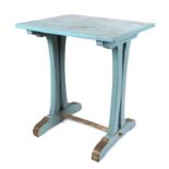 An early 20th century painted wooden tavern table, having a rectangular top on trestle supports,
