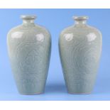 A Chinese celadon glaze Meiping vase within incised decoration, 26cm high; together with another