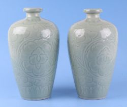 A Chinese celadon glaze Meiping vase within incised decoration, 26cm high; together with another