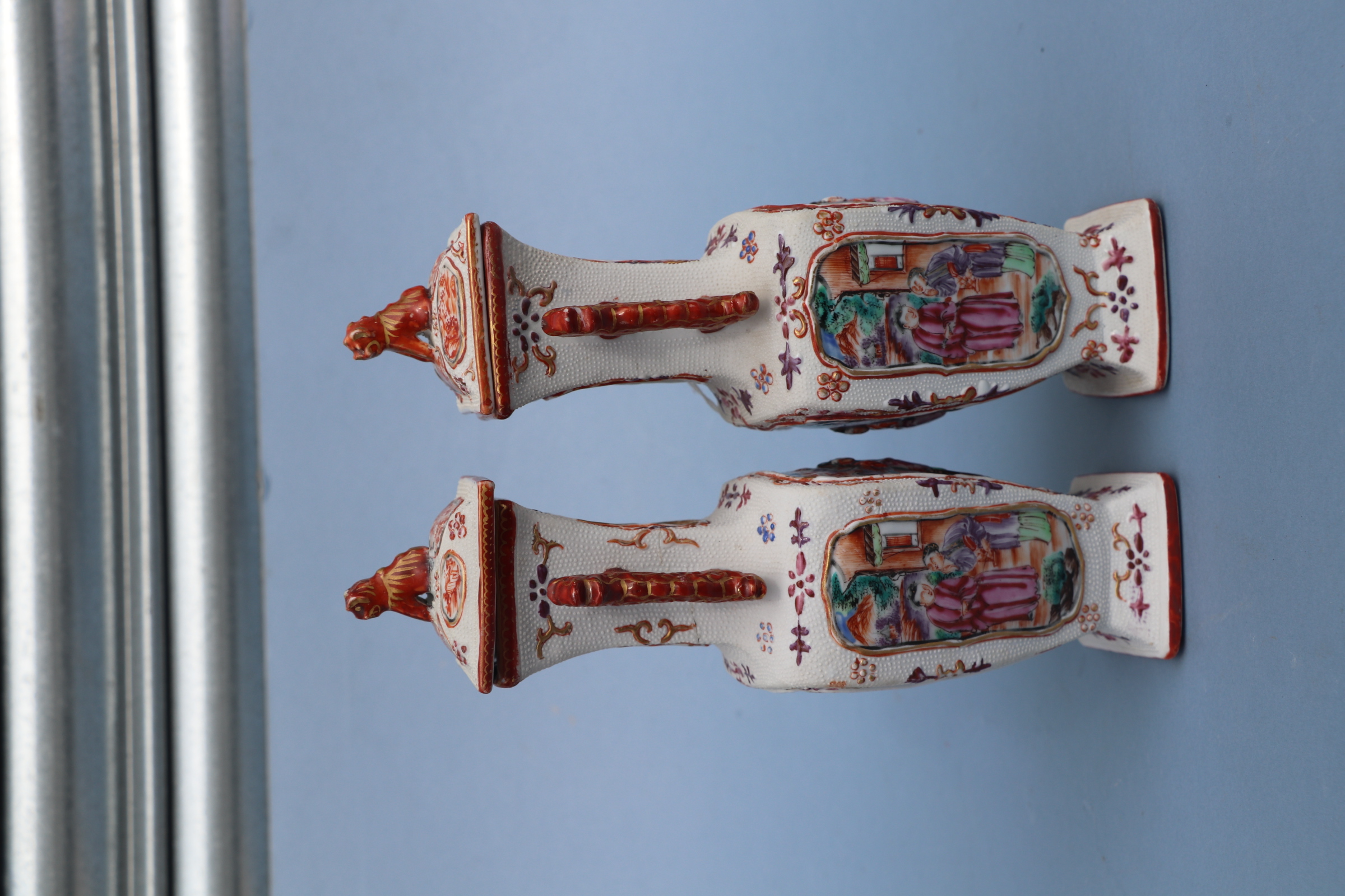 A pair of Chinese Mandarin palette famille rose Export vases and covers moulded in relief with - Image 18 of 25