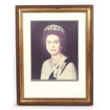 A photographic print of Her Majesty Queen Elizabeth II, 40 by 50cm, framed and glazed.