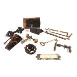 A collection of Georgian and Victorian door furniture, including coffer lock and key, door