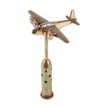 A trench art cast brass model of a Southerland aircraft, mounted on a brass plinth, wingspan 16cm.