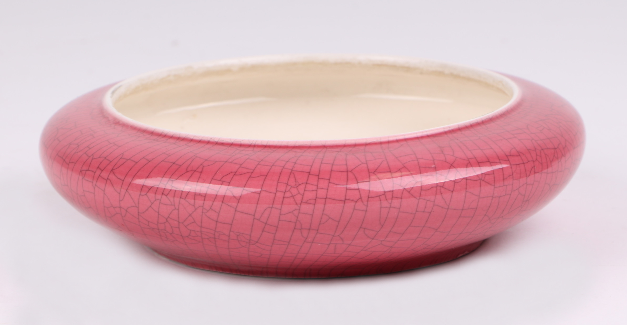A Chinese pink glazed crackle ware brush washer, with a hard wood stand, 16cm diameter. - Image 2 of 4