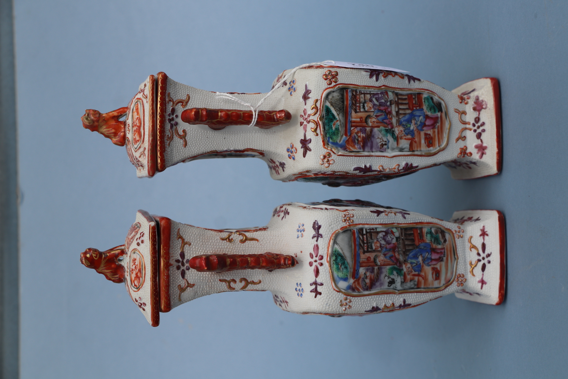 A pair of Chinese Mandarin palette famille rose Export vases and covers moulded in relief with - Image 20 of 25