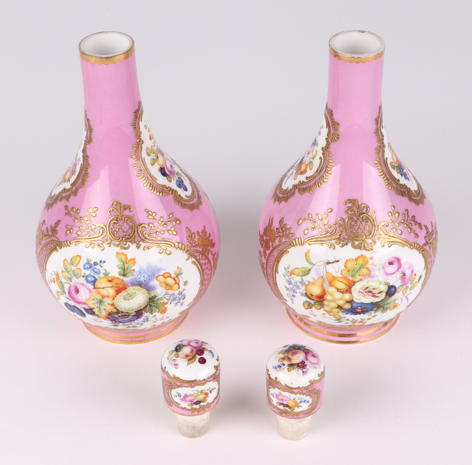 A pair of 19th century Sevres bottle vases and stoppers decorated with sprays of flowers within gilt - Image 4 of 6