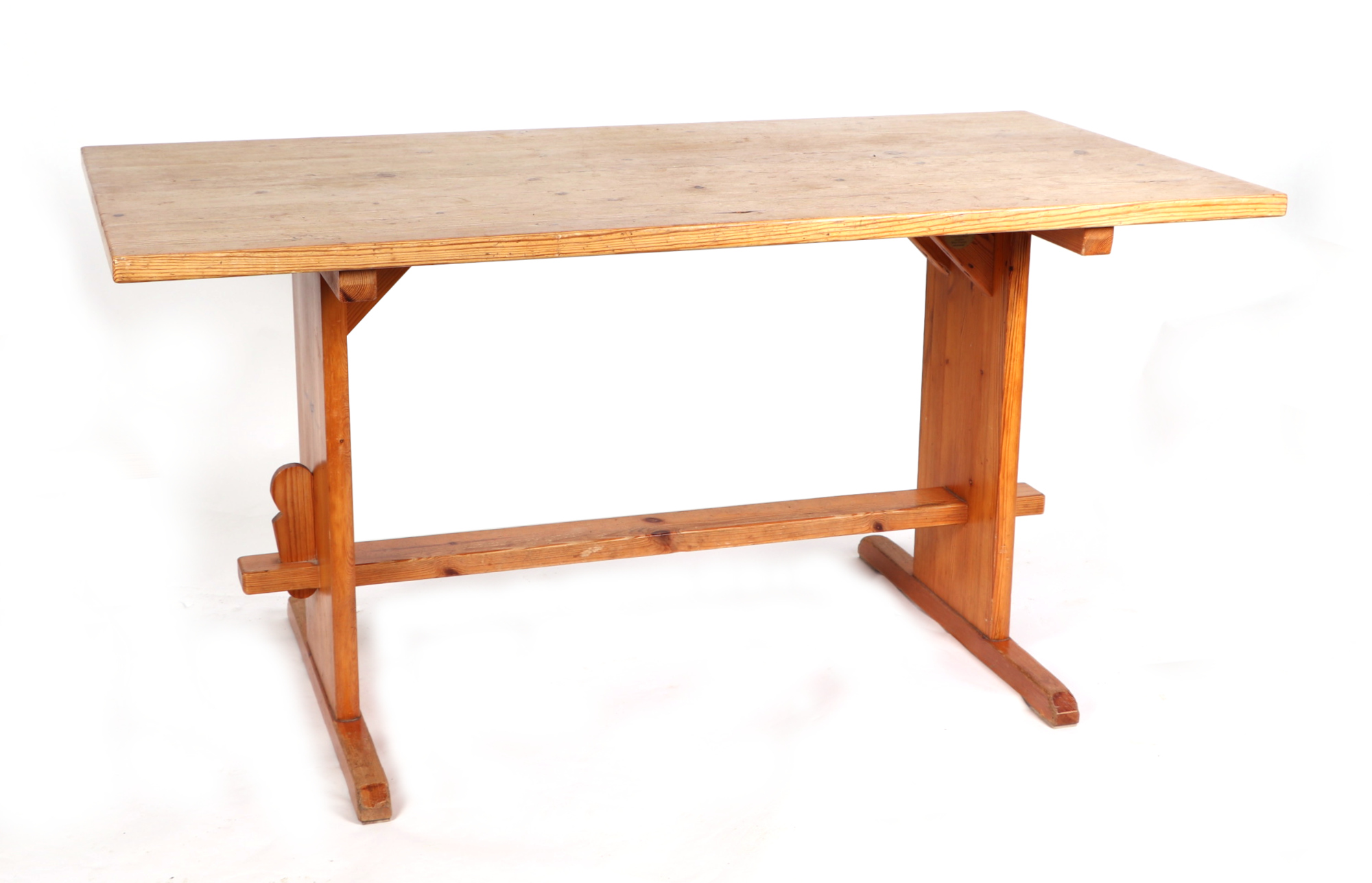 A modern pine refectory style table, having rectangular top, on style supports, joined by a