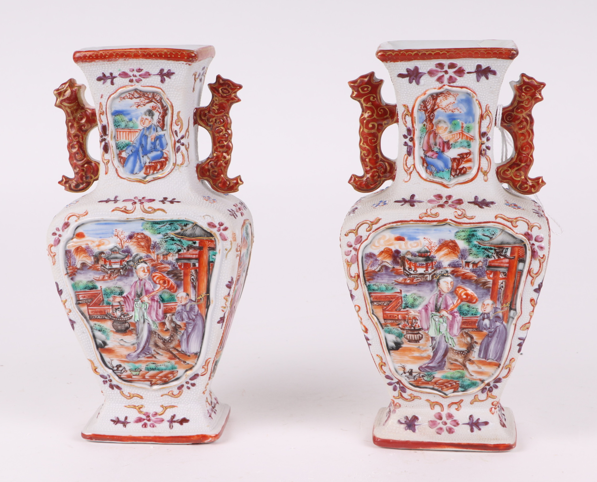 A pair of Chinese Mandarin palette famille rose Export vases and covers moulded in relief with - Image 3 of 25