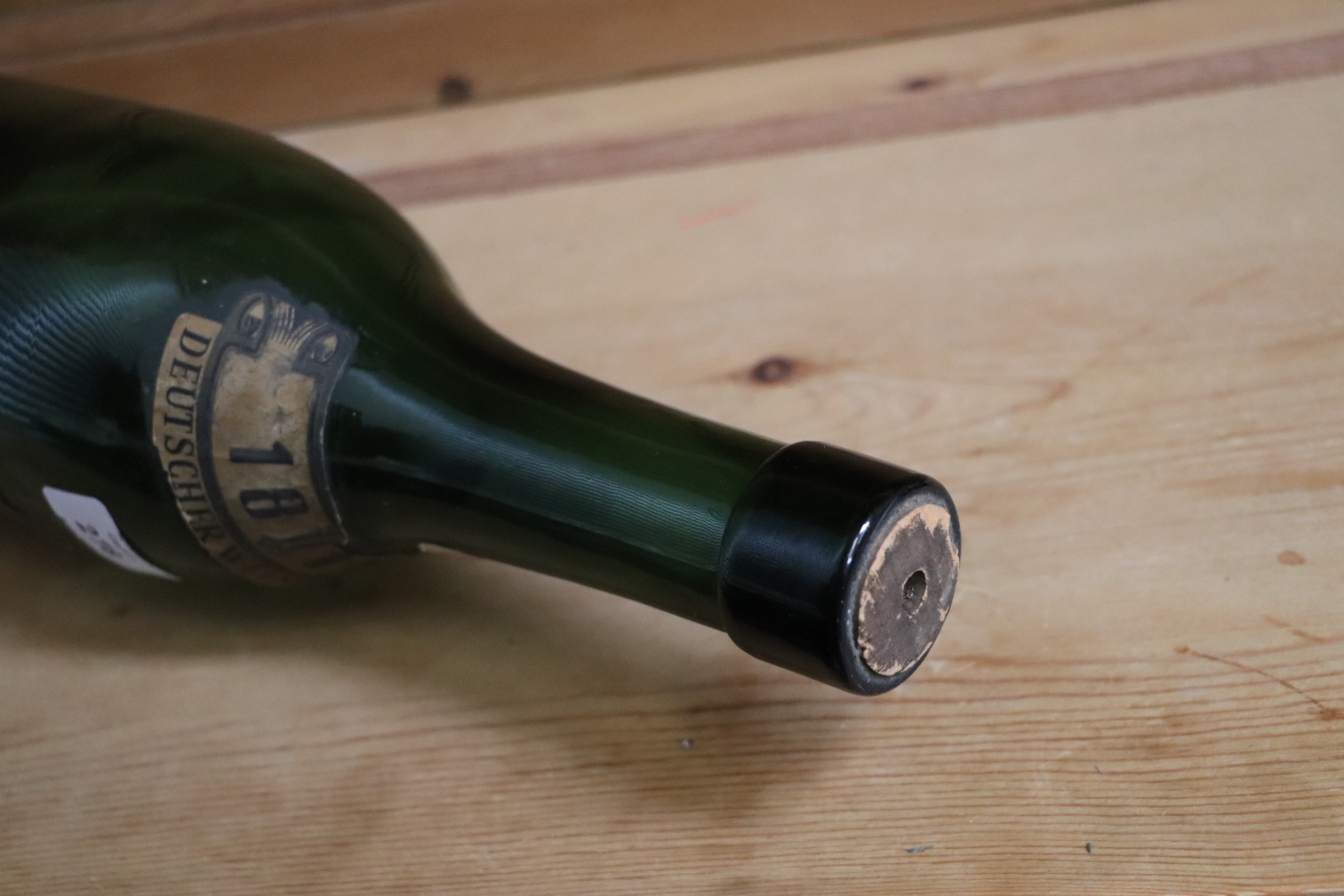 A large hand blown green glass German wine bottle, 51cm high. Condition Report There is a hole - Image 2 of 4