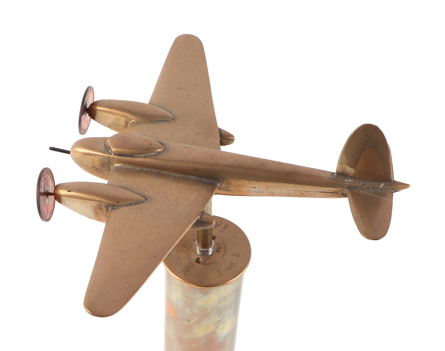 A trench art cast brass model of a Mosquito aircraft, mounted on a brass plinth, wingspan 20cm. - Image 2 of 2