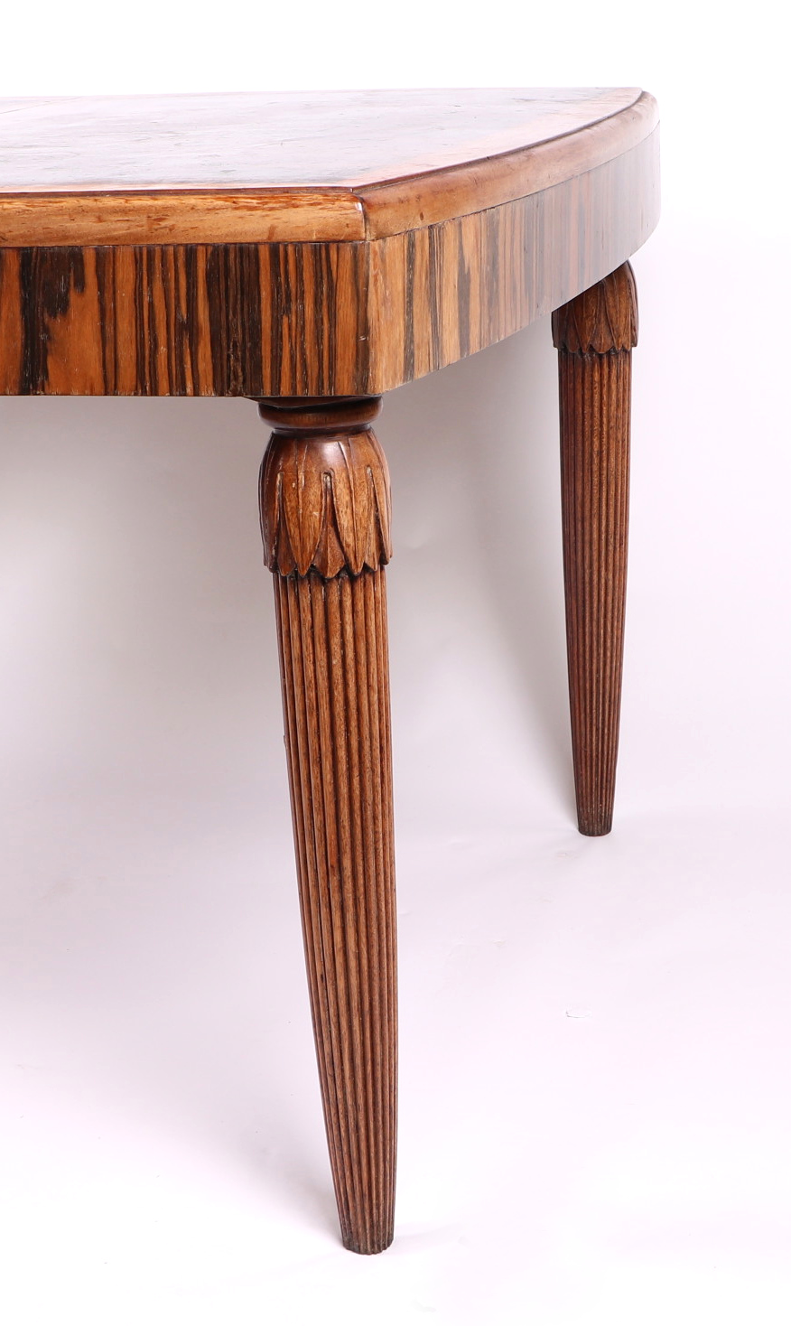 A 1920s Art Deco coromandel dining table, having a rectangular top inset, one extra leaf, on - Image 3 of 4