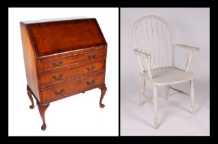 A Queen Anne style walnut bureau, having a fall front above three graduated long drawers, on