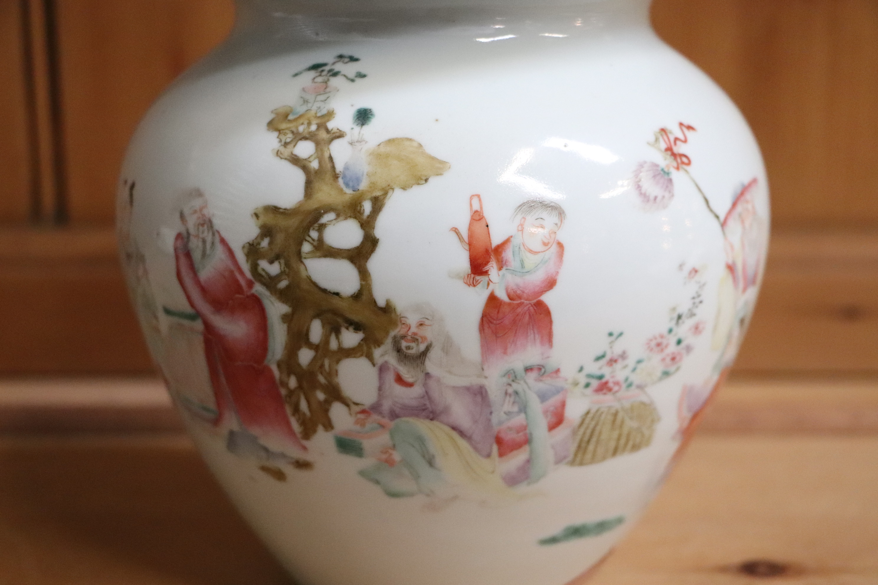 A pair of Chinese famille rose squat vases, decorated with figures and a landscape, mark to the - Image 7 of 14