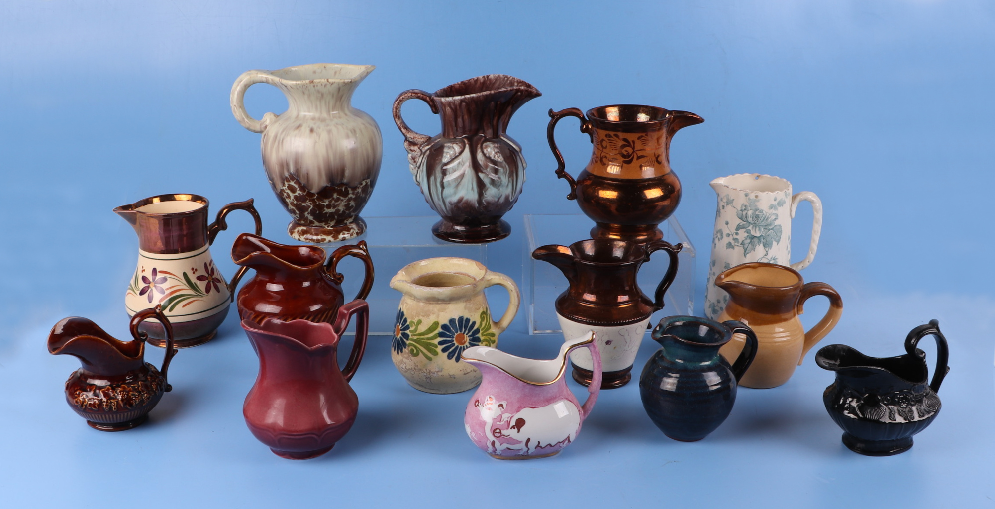 A collection of twenty two pottery milk and cream jugs, including examples by Royal Doulton, Losol - Image 3 of 3