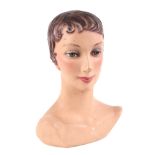 A 1950s French Jewellery's shop mannequin head, composition (gutta percha), with original finish,