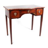 A 19th century mahogany serpentine front side table, having an arrangement of three drawers on