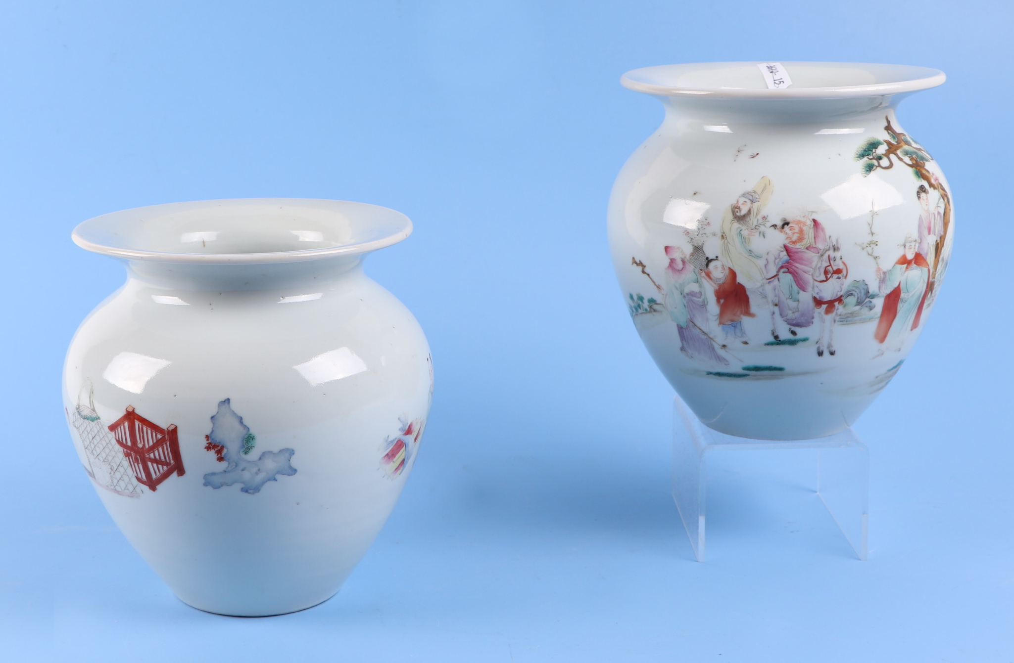 A pair of Chinese famille rose squat vases, decorated with figures and a landscape, mark to the - Image 2 of 14