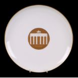 A KPM Berlin porcelain plate commemorating the 1936 Olympic Games, 26.5cm diameter.