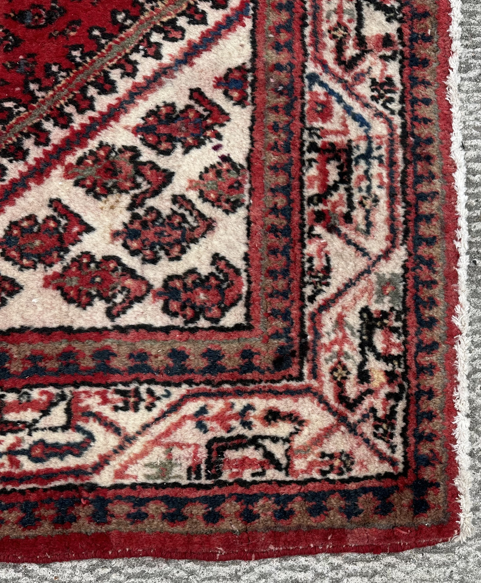 A Persian Arak rug, the central diamond medallion within repeating boteh and stylised borders, on - Image 2 of 3