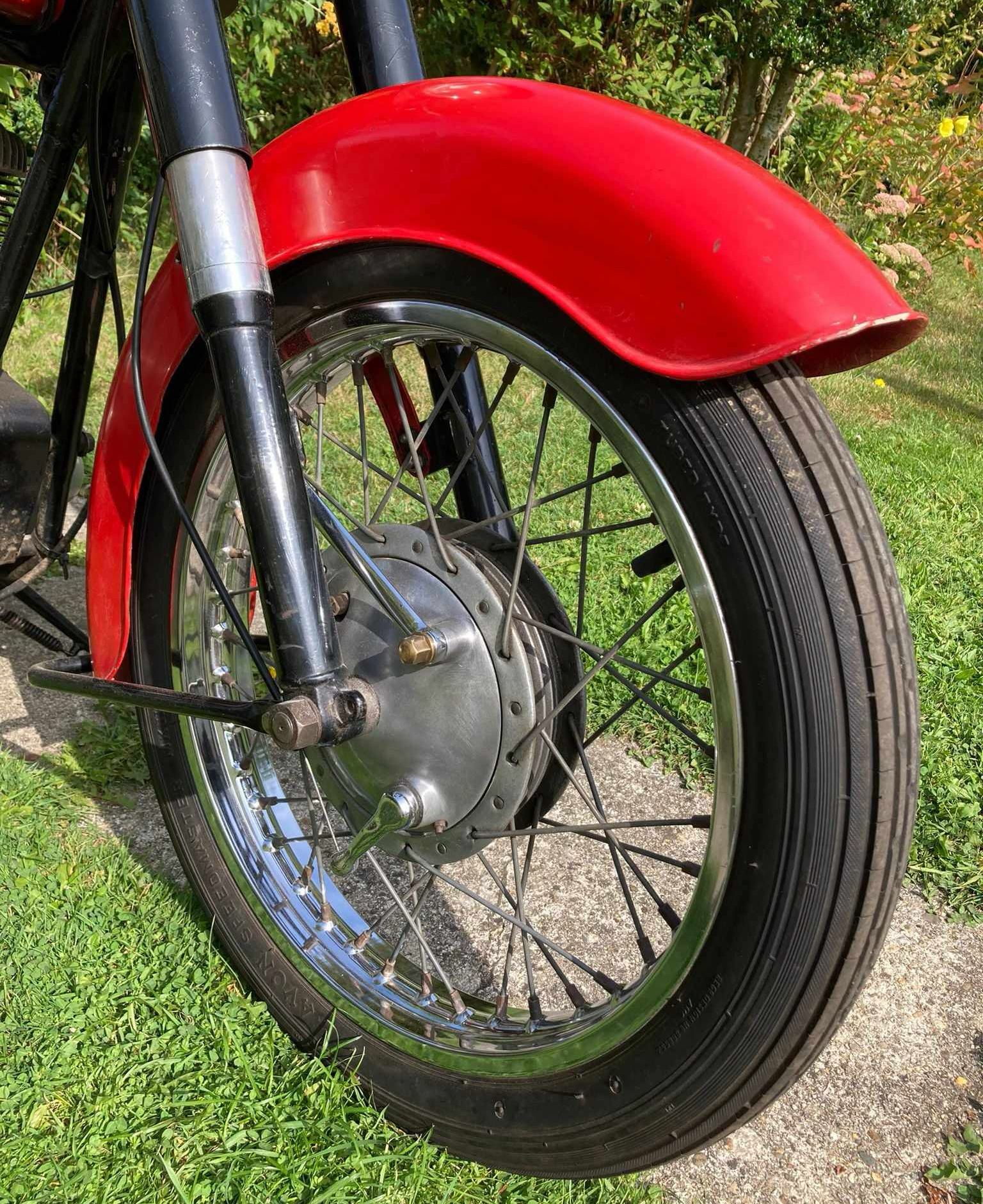 A 1957 Ariel VB600 single motor cycle, registration no. 613 XWD, red. This VB600 was despatched from - Image 4 of 11