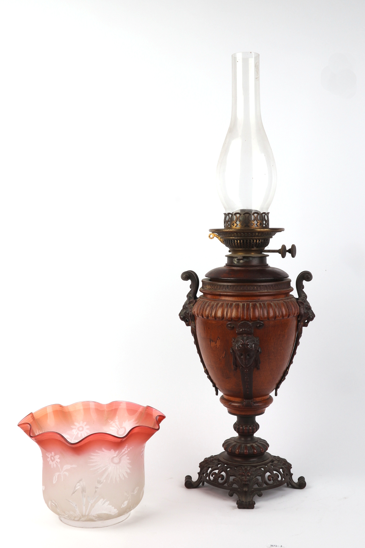 A neoclassical style 19th century oil lamp with lion mask handles, overall 65cms including flue. - Image 4 of 18