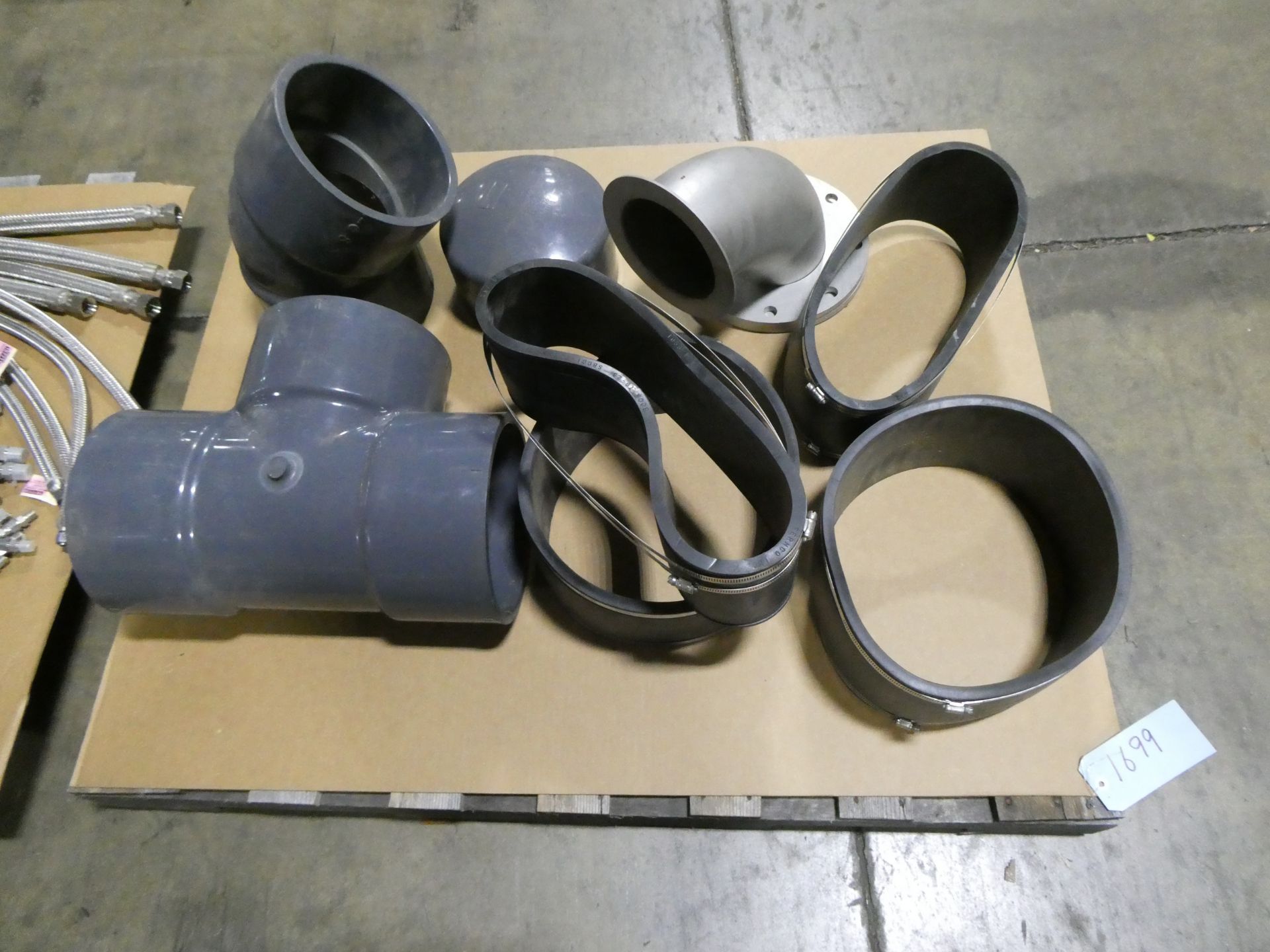 Pallet of Pipe Fittings and Flexible Pipe Couplings