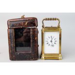 Miniature brass carriage clock in case